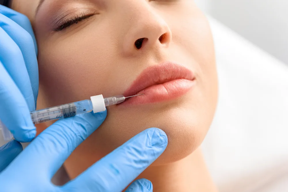 woman getting botox from dr david ghozland