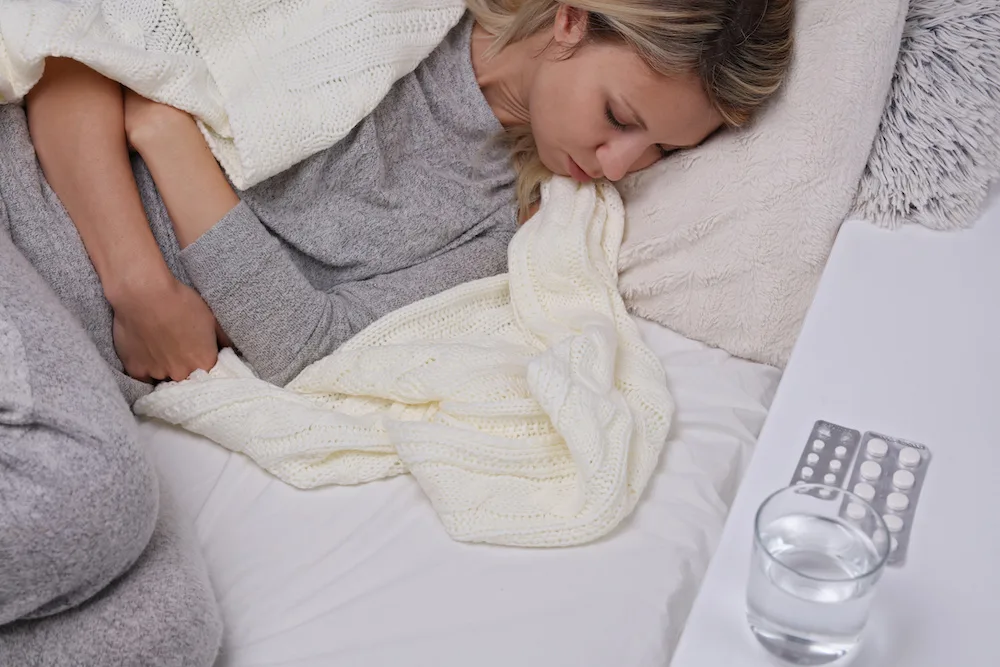 woman waiting for labiaplasty while dealing with a UTI