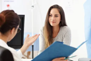 woman talking to doctor about her options with a vaginoplasty