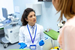 A patient speaking with her gynecologist about a potential procedure.