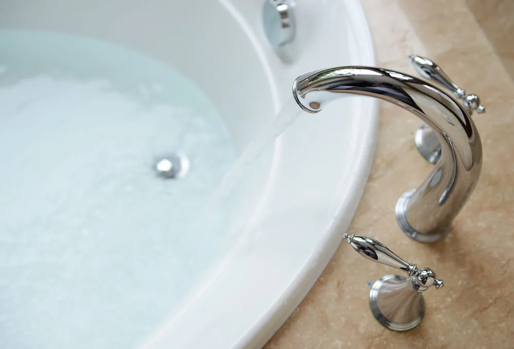 woman setting up a bath for her bartholin cyst treatment