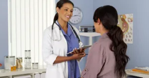 woman talking to gynecologist about vaginal surgery