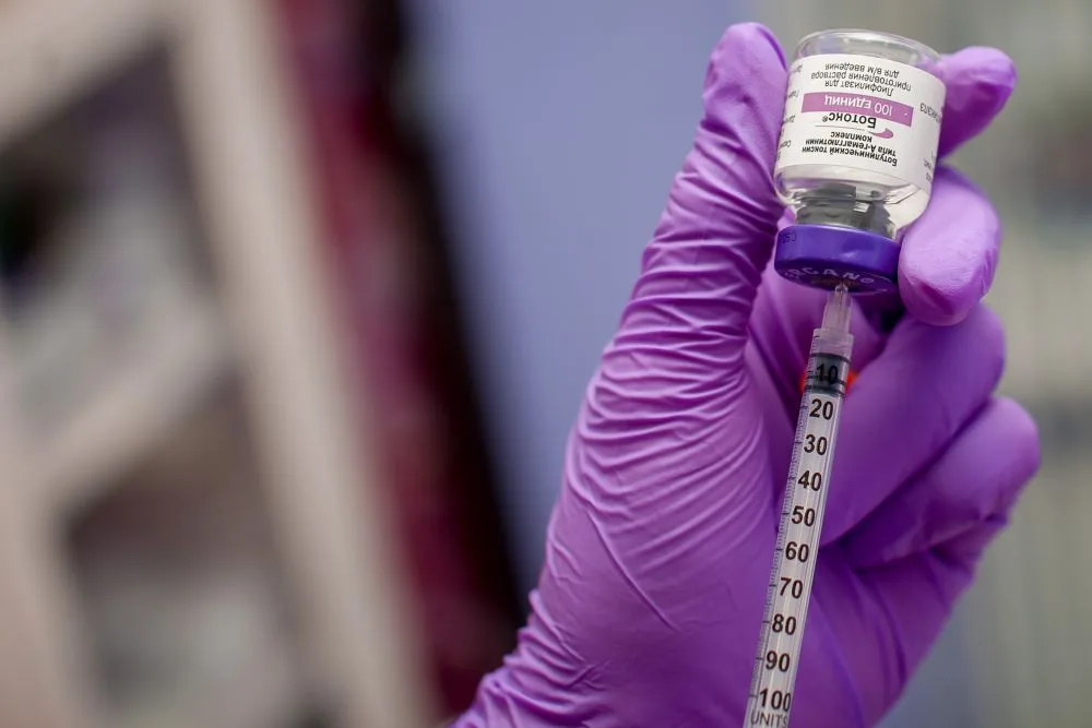 An injector at a medical spa prepping for a Botox appointment.