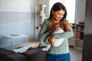 Family, motherhood, parenting, people baby and childcare concept.