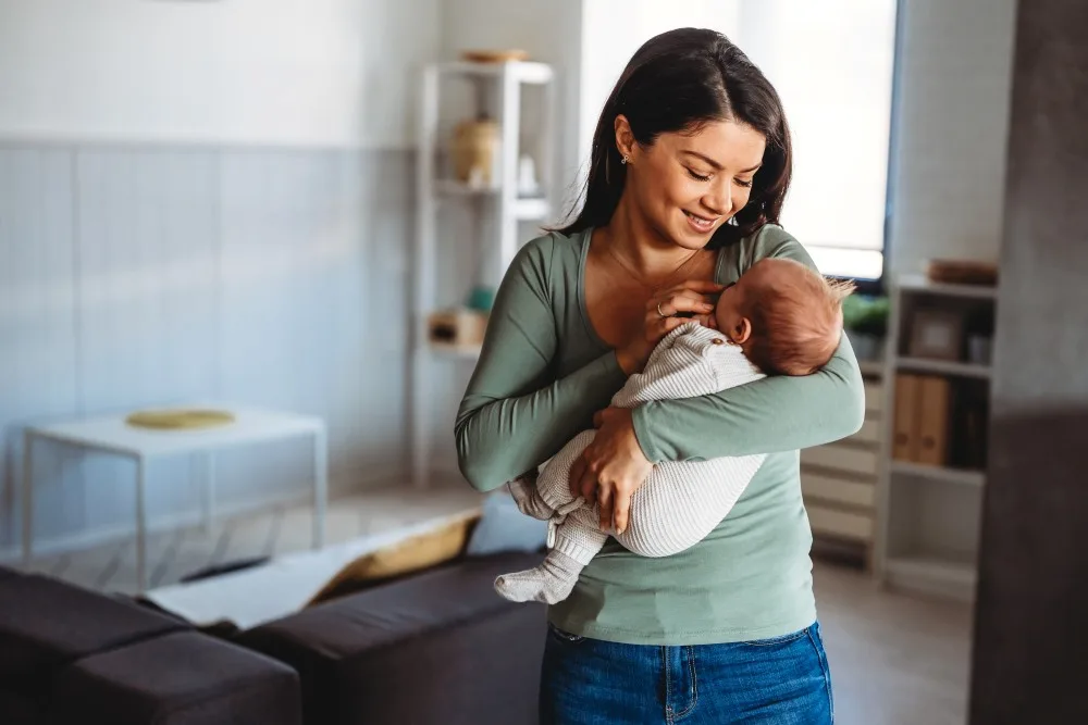 Family, motherhood, parenting, people baby and childcare concept.